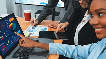 Financial dashboard data display on laptop screen. Concord